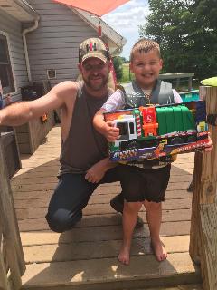 Rumpke Driver Joe King delivers toy trash truck to his biggest fan