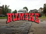 Rumpke Trash Truck In Neighborhood With Rumpke Logo